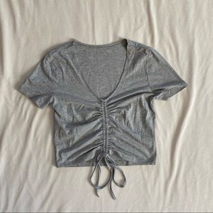 gray drawstring top